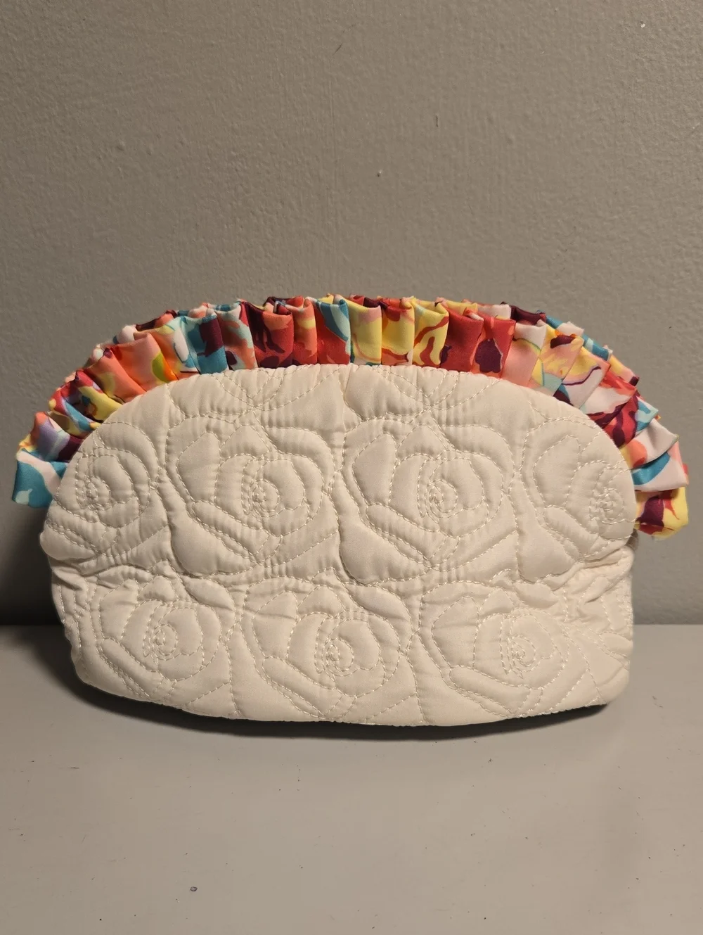 Betsey Johnson White Quilted Cosmetic Pouch with Multicolor Ruffle